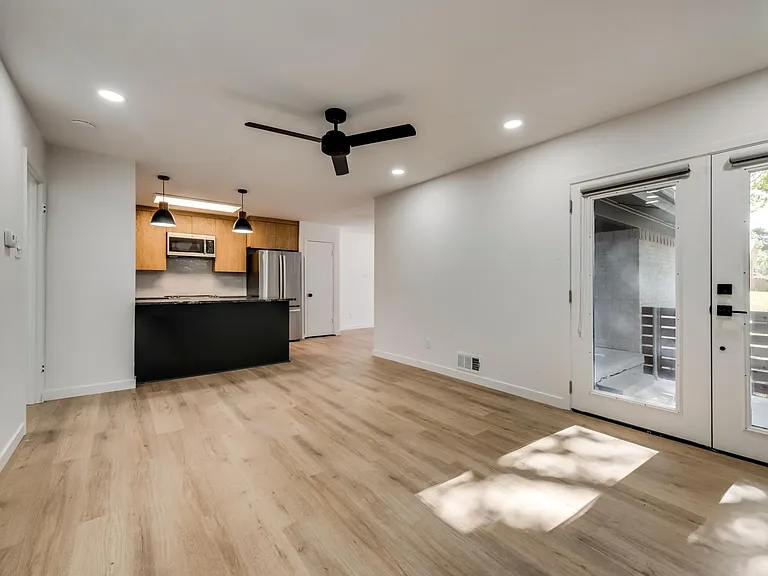 Living room looking into kitchen