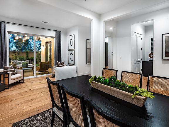 Formal Dining with access to side courtyard perfect for large family gatherings and dining alfresco.