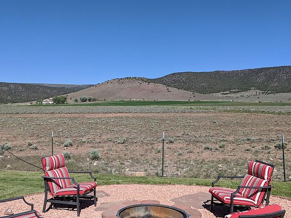Back yard fire pit area with view of Monroe mountain.