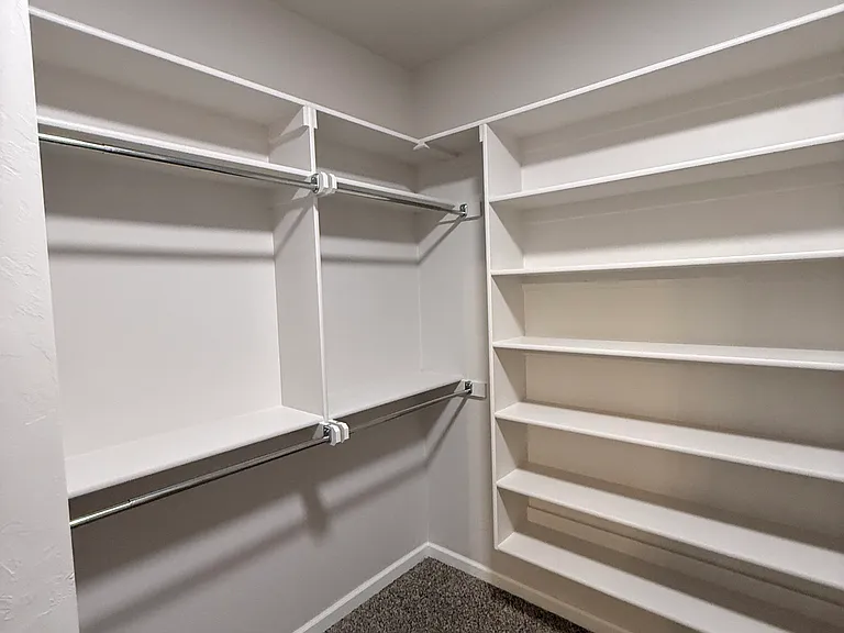 Primary Bedroom Walk in Closet