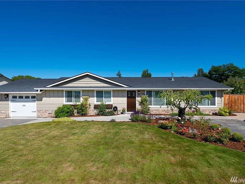 Welcome to 3219 K Ave.  This enchanting in town 3 bed, 2 bath rambler has been completely rebuilt with quality and attention to detail.  Located close to town, amenities, Hwy 20 and perfectly sited on a large corner lot. 