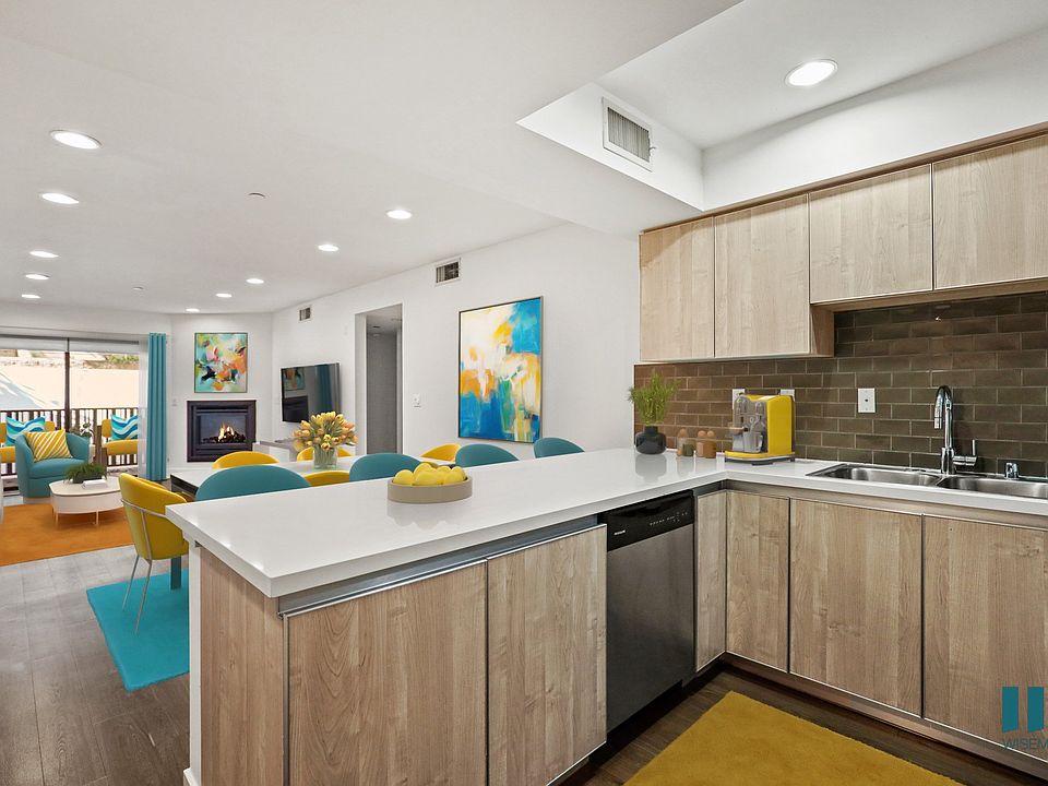 Open-Concept Kitchen, Dining, Living Room with Patio
