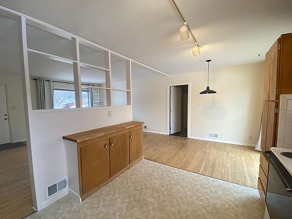 The kitchen also has a beautiful new butcher-block wood counter.