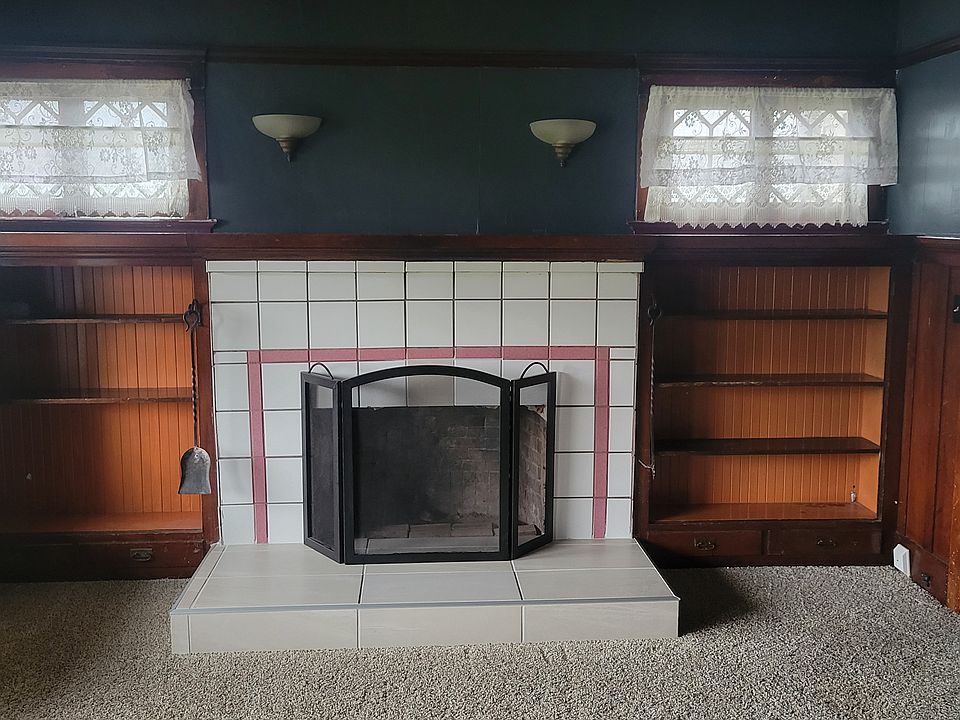 Front room fireplace bookcases