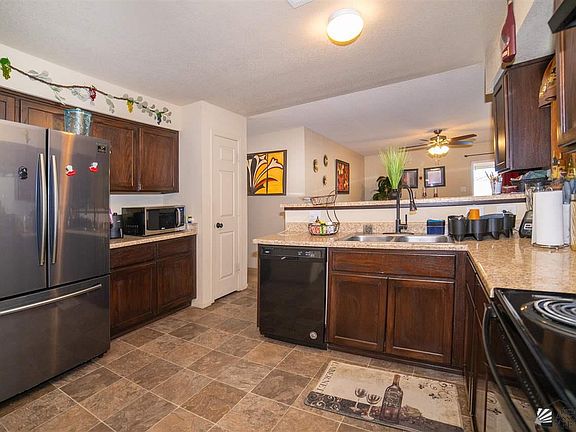 5th image of 7054 E 38th Pl