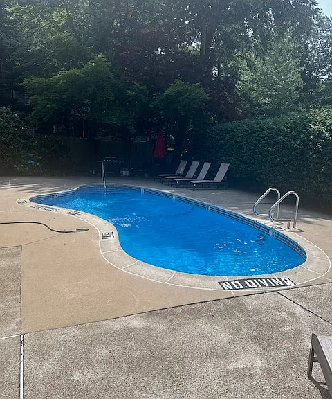 310 Hammond Pond Pkwy #103 — Photo 15