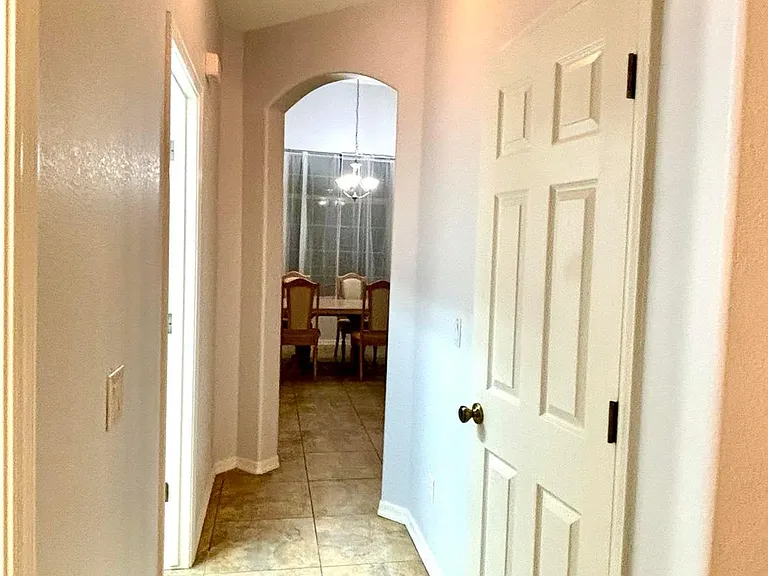 Hallway connect game room to livingroom & laundry room