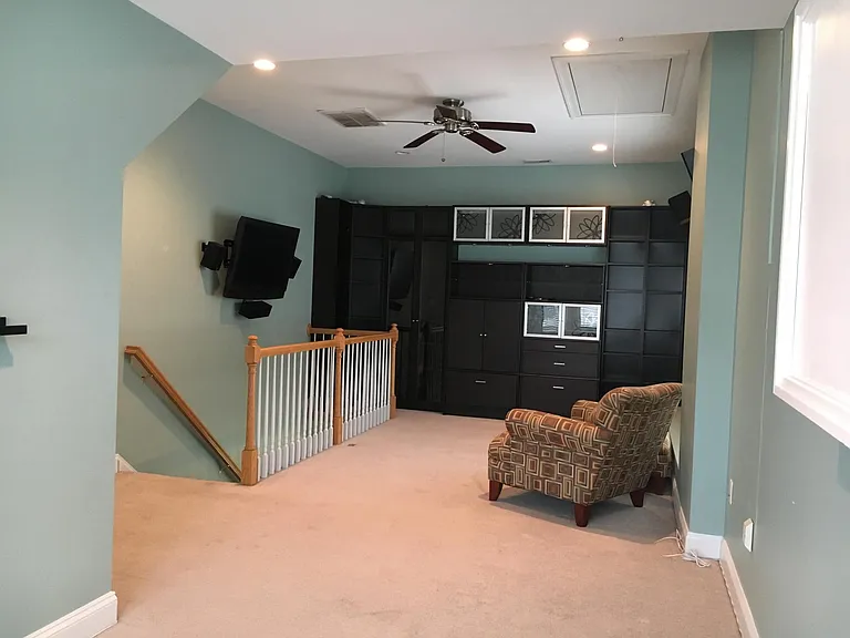 Custom built in wall unit. Great space for home office, third bedroom, bonus family room or all three!