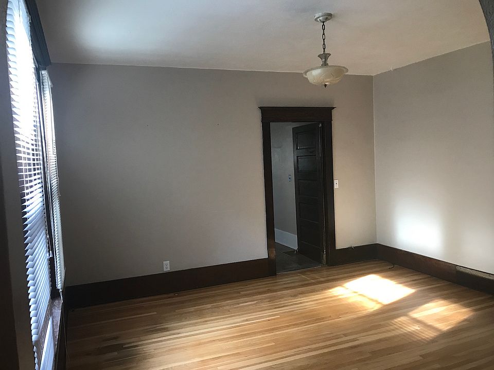 Living room. (Photo is of a mirror-image apartment.)