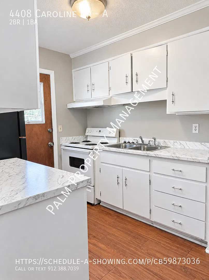 2 Bedroom, 1 Bathroom main floor apartment with updated flooring throughout! — Photo 3
