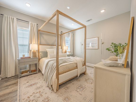 Primary bedroom in the Decatur floorplan at a Meritage Homes community in Gulfport, MS.