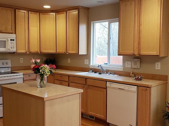 Kitchen with all appliances and lots of cabinets.