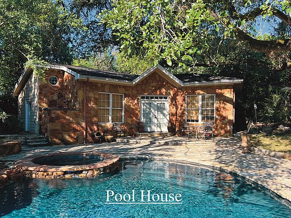 Pool House / Guest House
This is a separate building in the backyard. Great for relaxing, working out or use as a guest house or office.
Has a half bath with outdoor shower, microwave, TV, mini-fridge and pool table.