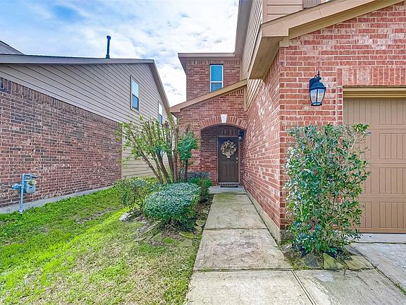 Passage way  leading to front door Patio area
