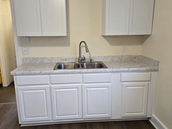 Kitchen, new sink and plenty of new cabinets