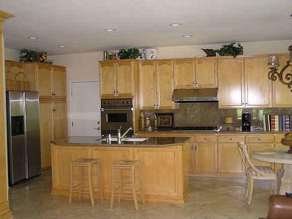 Eat-in kitchen with granite counter tops and Viking and Miele appliances