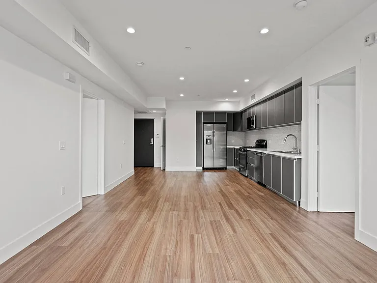 Open-Concept Kitchen, Dining, and Living Room Areas