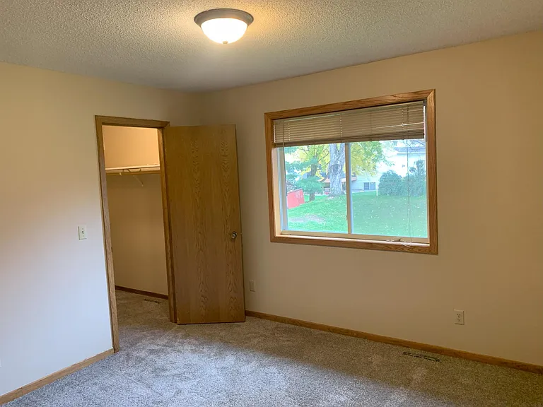 2nd bedroom on upper level with walk-in closet