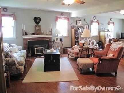 Living room
						:
						Wood floors and wood burning fireplace
