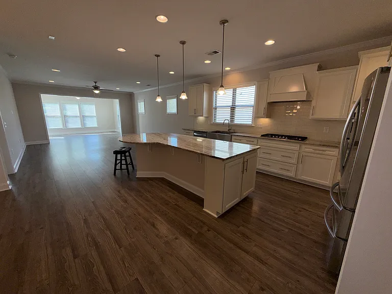 Upgraded Cabinets, Counters and Backsplash