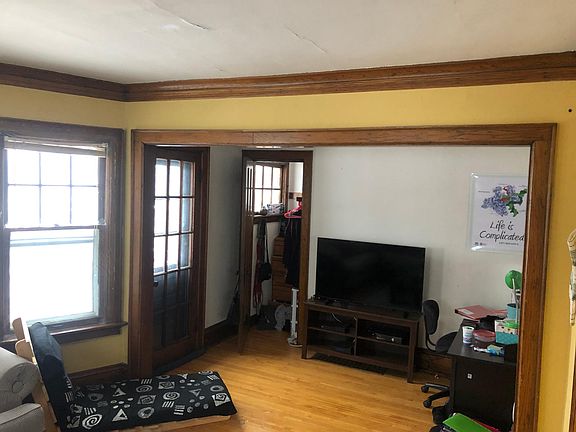 living room toward door to front porch
