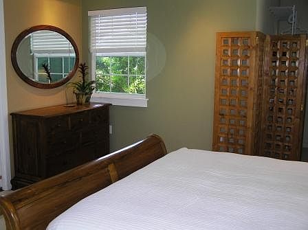 Cal King bed, linens, dresser provided. Walk-in closet to right.