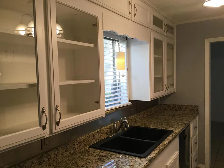 Galley Kitchen with Granite