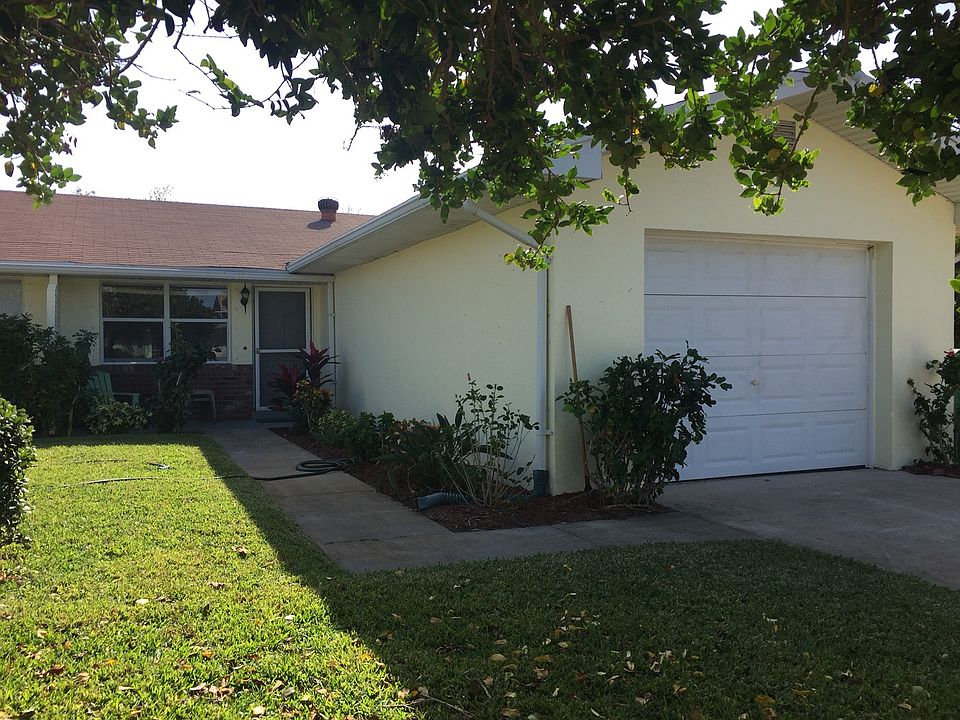 Front entrance walkway and garage