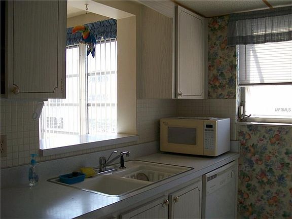 5th image of 5623 80th St N Unit 409
