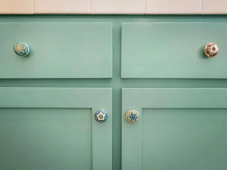 Talavera Style knobs and designer touches throughout.