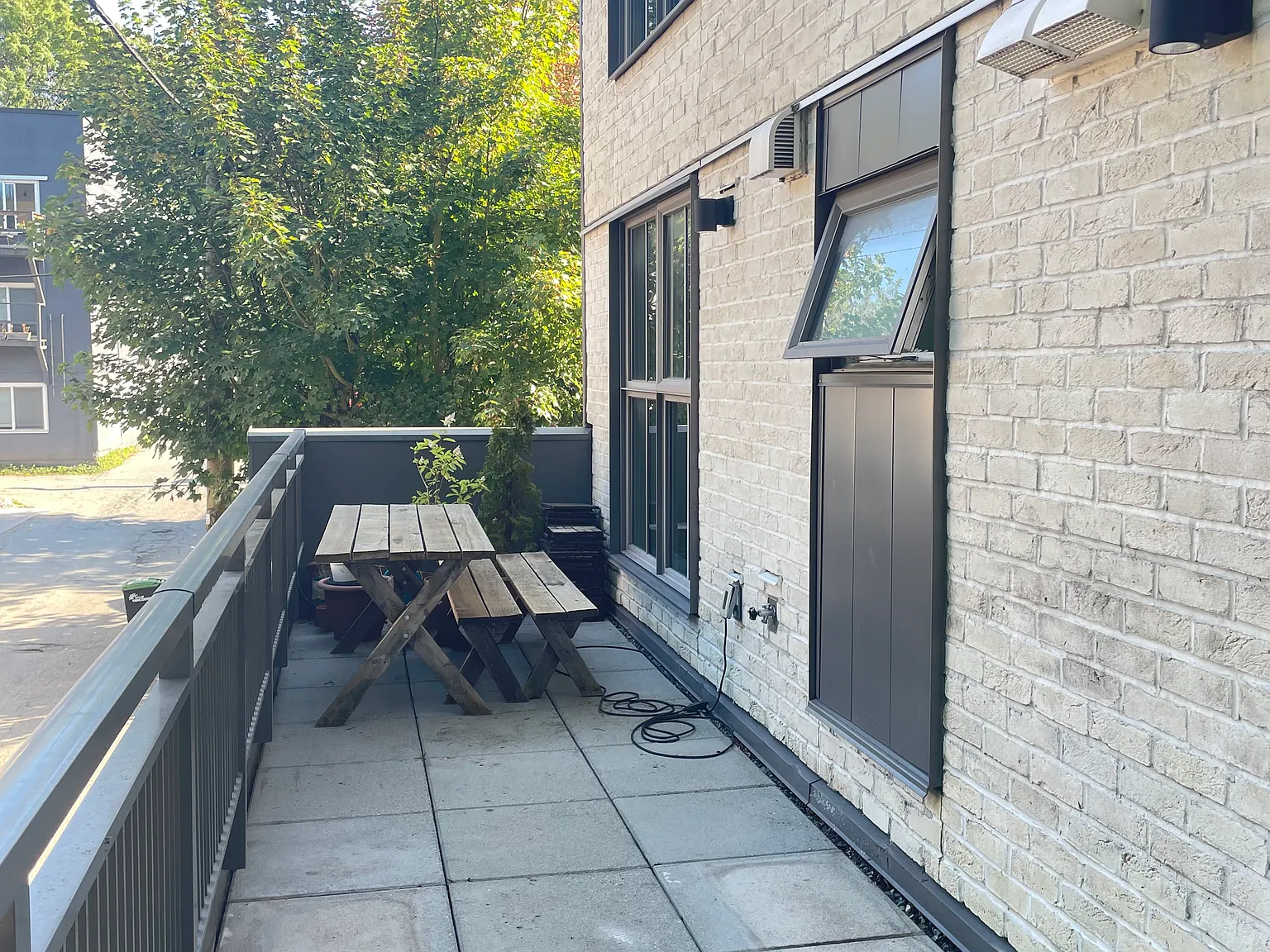 Special Offer: $2,795/Month 2-Bedroom Suite With A 6' X 33' Private Patio | #2011716 Napier Street — Photo 4