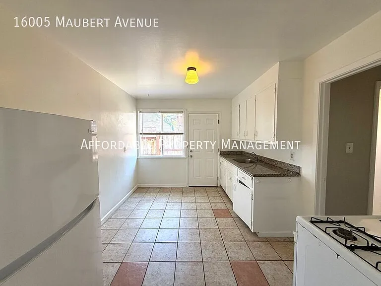 16005 Maubert Ave — Photo 6