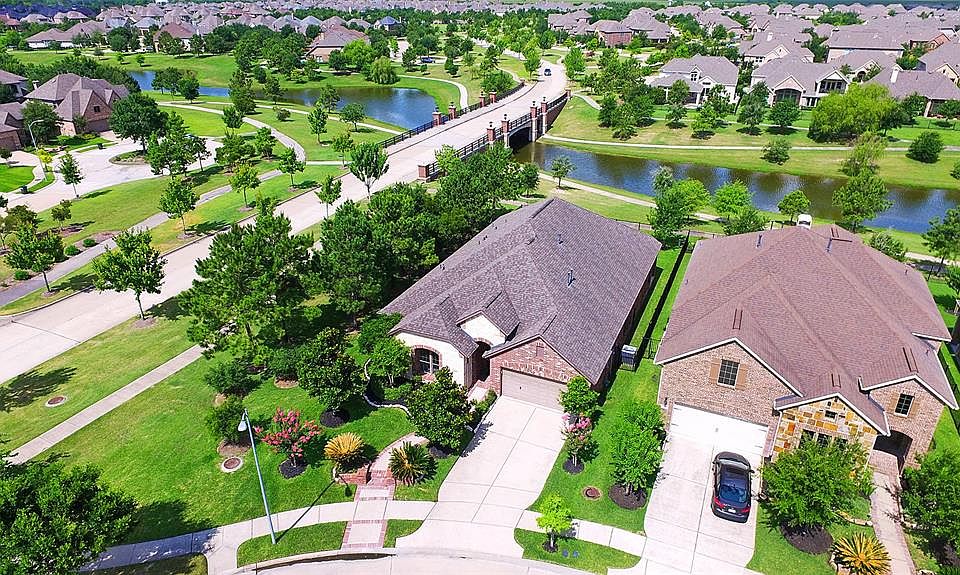 Lovely one story home backing to the lake with only one neighbor!