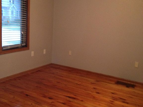 First floor bedroom with hardwood floors