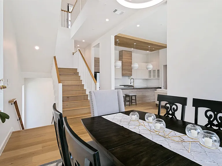 Open dining room with easy access to living room and kitchen.