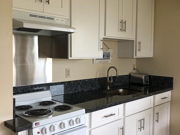 Full kitchen with granite countertops
