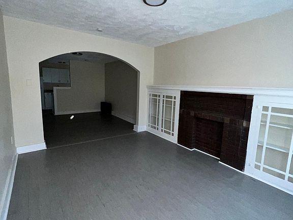 Living room opens to Dining and kitchen