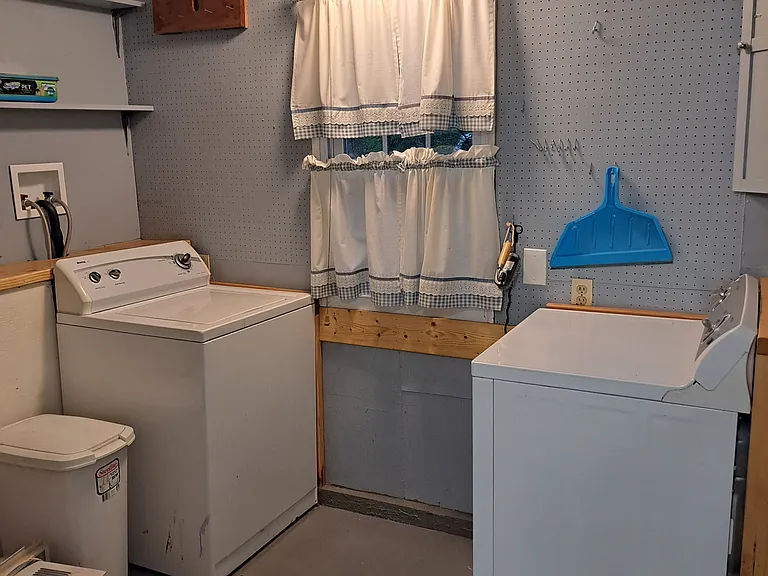 Utility room with washer and dryer