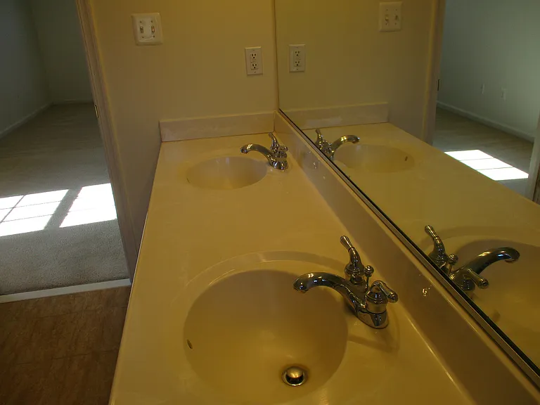 Top View of Double Sinks in Owner's Bathroom