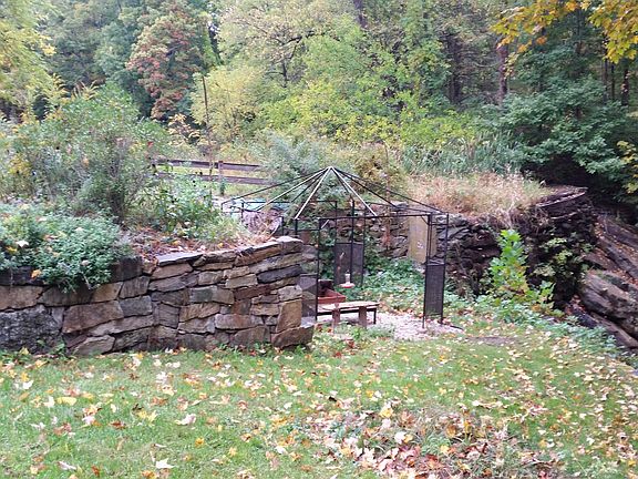 yard to deck overlooking waterfall