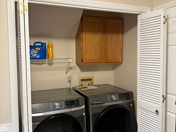 New Samsung frontloading washer and dryer set is in the kitchen