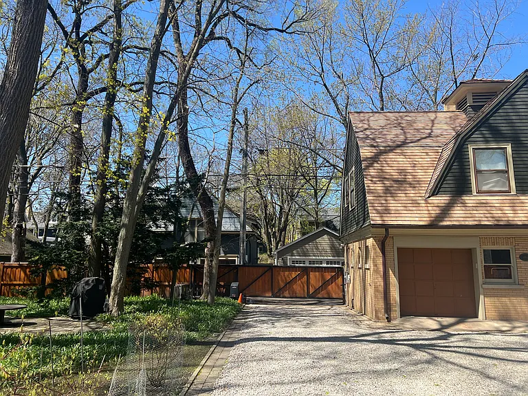 Cantilevered electric gate at the rear of the property allows for easy access by car or foot traffic. 1 exterior parking space is available for an additional cost of $125.00 per month.