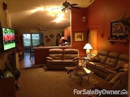 LOOKING FROM THE ENTRY THRU THE SUNROOM
						:
						This home has a very open layout that is great for entertaining
