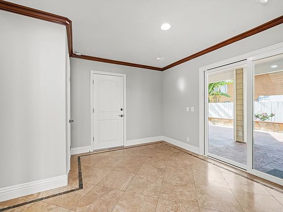 Interior garage access and door to private patio