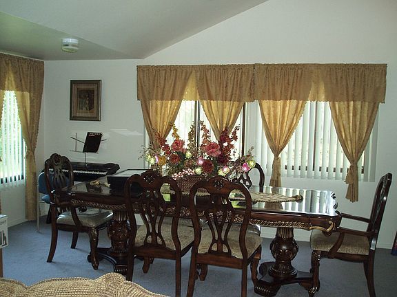 Spacious Light & Bright Dining Area with Sloped/Vaulted Ceiling.