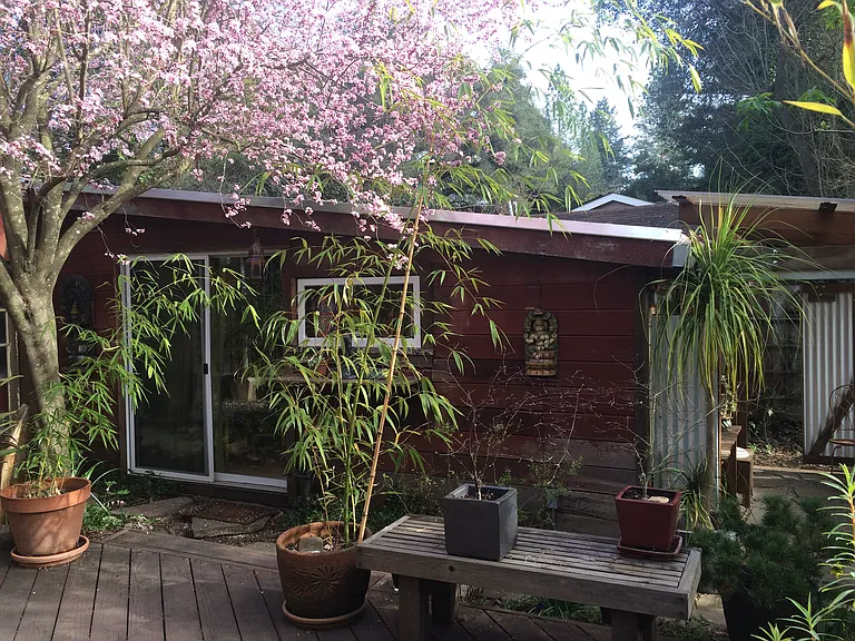 studio with attached outdoor bathroom