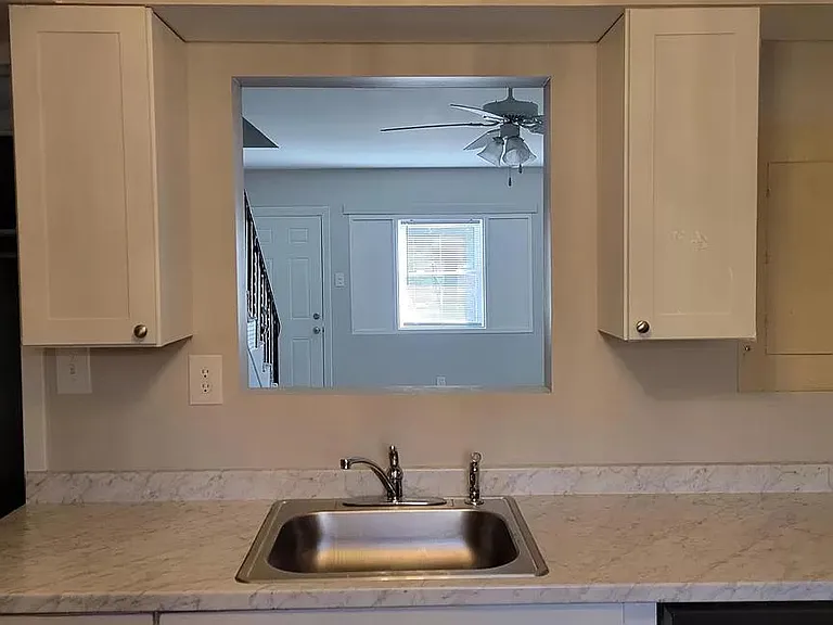 Light, bright kitchen with new cabinets, new countertops, new fixtures and appliances.