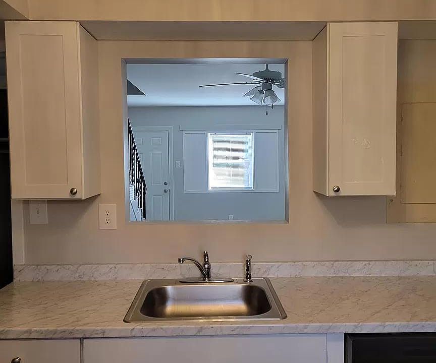 Light, bright kitchen with new cabinets, new countertops, new fixtures and appliances.