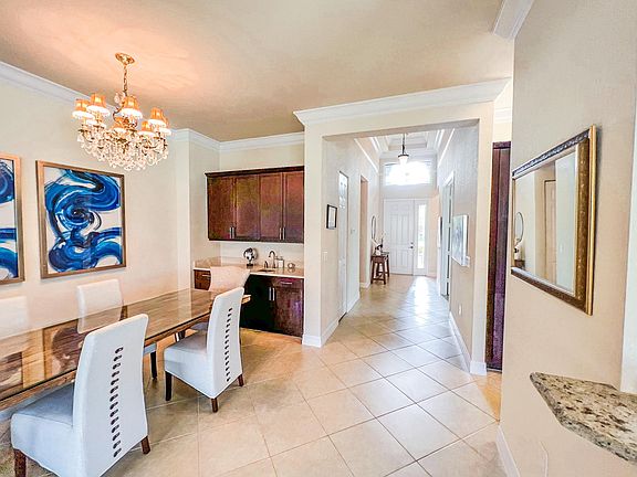 Entry and open dining room.