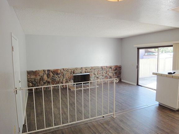 Sunken family room with wood burning fireplace